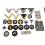 German Third Reich various cloth insignia.7 assorted Wehrmacht chevrons ... 14 assorted arm/trade