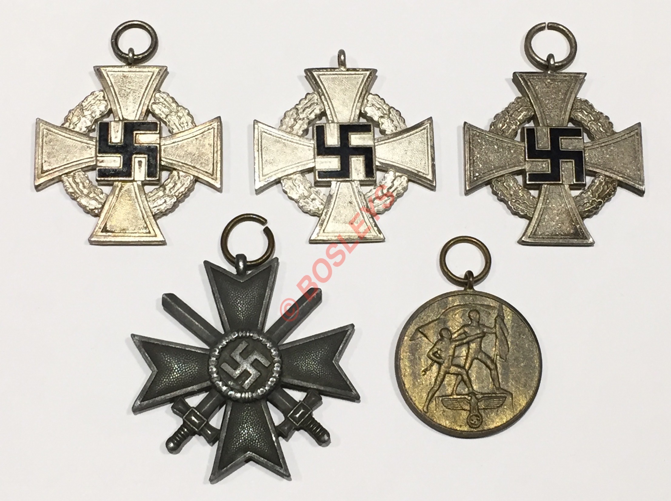 German Third Reich. 5 various medals.3 x silvered Faithful Service Crosses with black enamel