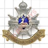 Sherwood Foresters Officer’s cap badge post 1901.Fine die-cast silvered example with gilt scroll and