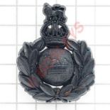 Royal Marines scarce WW2 dark blue plastic economy cap badge.(KK 2246)A.Stanley & Sons,