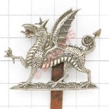 Welsh. 1st Bn. Monmouthshire OR’s cap badge circa 1908-22. Die-stamped white metal Welsh Dragon.