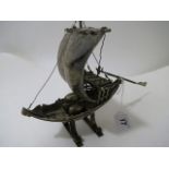 A Portuguese silver model of a sailing vessel dated 2.7.79 and inscribed to base, hallmarked Porto