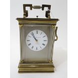 A Matthew Norman brass and silver plated repeating carriage clock. Lacquered brass case with
