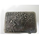 Circa 1890 a Russian silver cigarette case with heavy repousse work, one side depicting a soldier