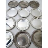 A set of twelve 800 continental silver coasters, total weight 1266.4g