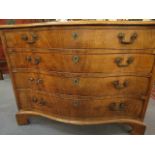 A George III mahogany serpentine fronted chest of four graduated drawers with later handles and