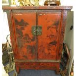 An 18th century oriental red lacquered two door cabinet on squared legs, 50 high x 37 1/2 wide x