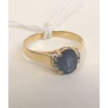 An 18ct gold sapphire and diamond set ring