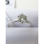 A white gold diamond solitaire ring set with a single brilliant cut diamond