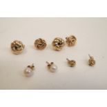 Four pairs of 9ct gold earrings