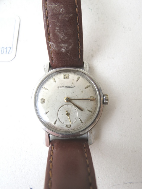 A 1940s gents stainless steel Jaeger LeCoultre wrist watch with subsidiary seconds and fancy lugs,