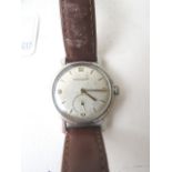 A 1940s gents stainless steel Jaeger LeCoultre wrist watch with subsidiary seconds and fancy lugs,