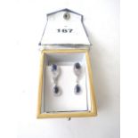 A pair of white metal gold coloured sapphire (maybe Sri Lankan) and diamond set ear pendants