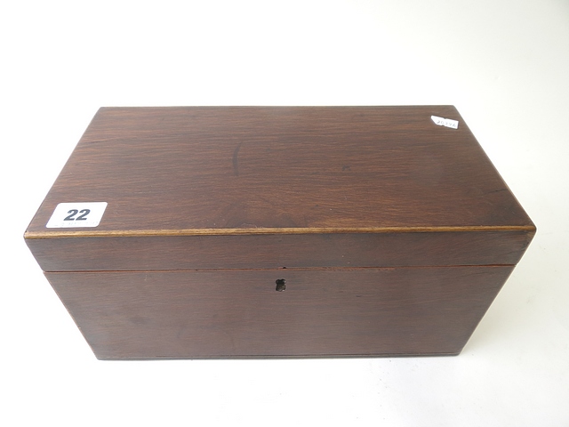An early 19th century exotic hardwood, string inlaid tea caddy with fitted interior