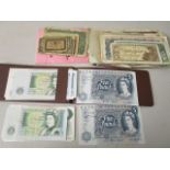 A group of British and foreign currency to include a page and a Farde five pound note, various £1