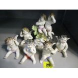 Five late 19th century porcelain figures, all marked R to the underside, possibly for Rauenstein,