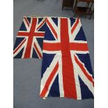 Two mid 20th century Union Jack flags, largest 106 x 50, smallest 68 x 32