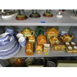 A ceramic lot to include cottage ware, blue and white Willow tableware's and a Devon ware Glug-