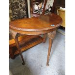 A square, glass topped, two tier coffee table, together with two reproduction mahogany demi lune