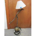 A modern iron angle poise table lamp