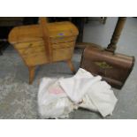 An 1874 Singer sewing machine in case, a vintage sewing box, and a selection of linen to include