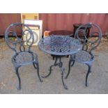 Pressed aluminium circular table, 28 h x 24 1/4 w and two chairs