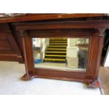 An Edwardian mahogany Sheraton revival mirror, rectangular glass plate flanked by shaped pillars, 30