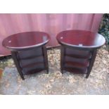 A pair of reproduction oval, three tier side tables, 24 1/4 x 22