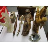 A mixed lot to include a carved wooden elephant and two lions, antler cigar cutter and other items