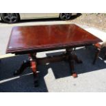 A modern mahogany extending dining table, 19 1/2 h, 48 1/4 w (un-extended)