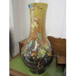 A late Victorian pottery vase of ovoid form decorated with birds and flowers, signed 24 1/2h