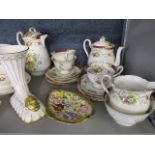 A pair of Coalport cornucopias, a table centre piece decorated with a putti, a Minton cake plate and