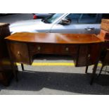 A mid 20th century reproduction George III mahogany bow fronted dresser, with a drawer and two