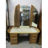 An Art Deco teak dressing table, 61 3/4 h, 46 3/4w