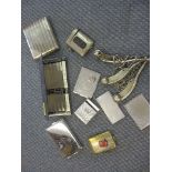 Silver plated cigarette boxes, stamp boxes, and a Composite pocket set No.130