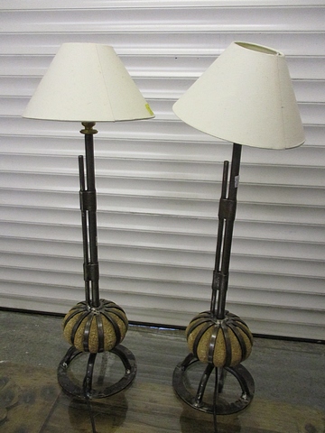 A pair of modern, wrought iron table lamps