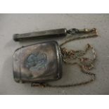 An early 20th century silver vesta case on a chain, and an attached silver cased pencil