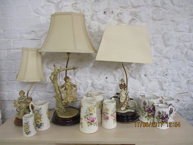 Modern china jugs, various sizes and three composition figural table lamps and shades