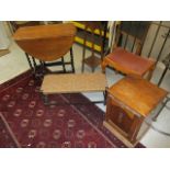 An early 20th century furniture to include two stools, a purdonium, a drop leaf table and a plant