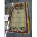 A 1930s coloured lead glass panel, 40 1/2 x 19 1/2