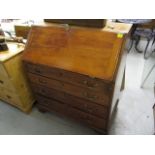 A George III mahogany bureau with four graduated long drawers on bracket feet, 40 h x 34 w