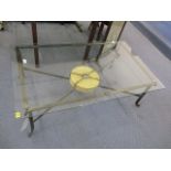 A modern, wrought iron and glass topped coffee table, 16 1/2 h, 51 1/4 w