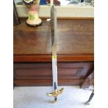 A large ceremonial sword with a gilded handle decoration, 48 long