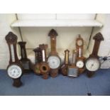 Eight late 19th century oak cased barometers and a contemporary mahogany cased example