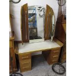 An Art Deco teak dressing table, 61 3/4 h, 46 3/4w