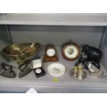 A mixed lot comprising an inlaid mantle clock, ebonized elephants, metalware to include silver