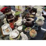 A mixed lot of ceramics to include a Royal Doulton vase A/F, water jugs, collectors' plates and a