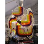 A 1960s chrome centre light with coloured and clear Perspex discs