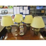 Four brass table lamps and a Chinese style table lamp