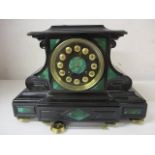 A late Victorian black marble and malachite cased mantle clock on button feet, with an Arabic